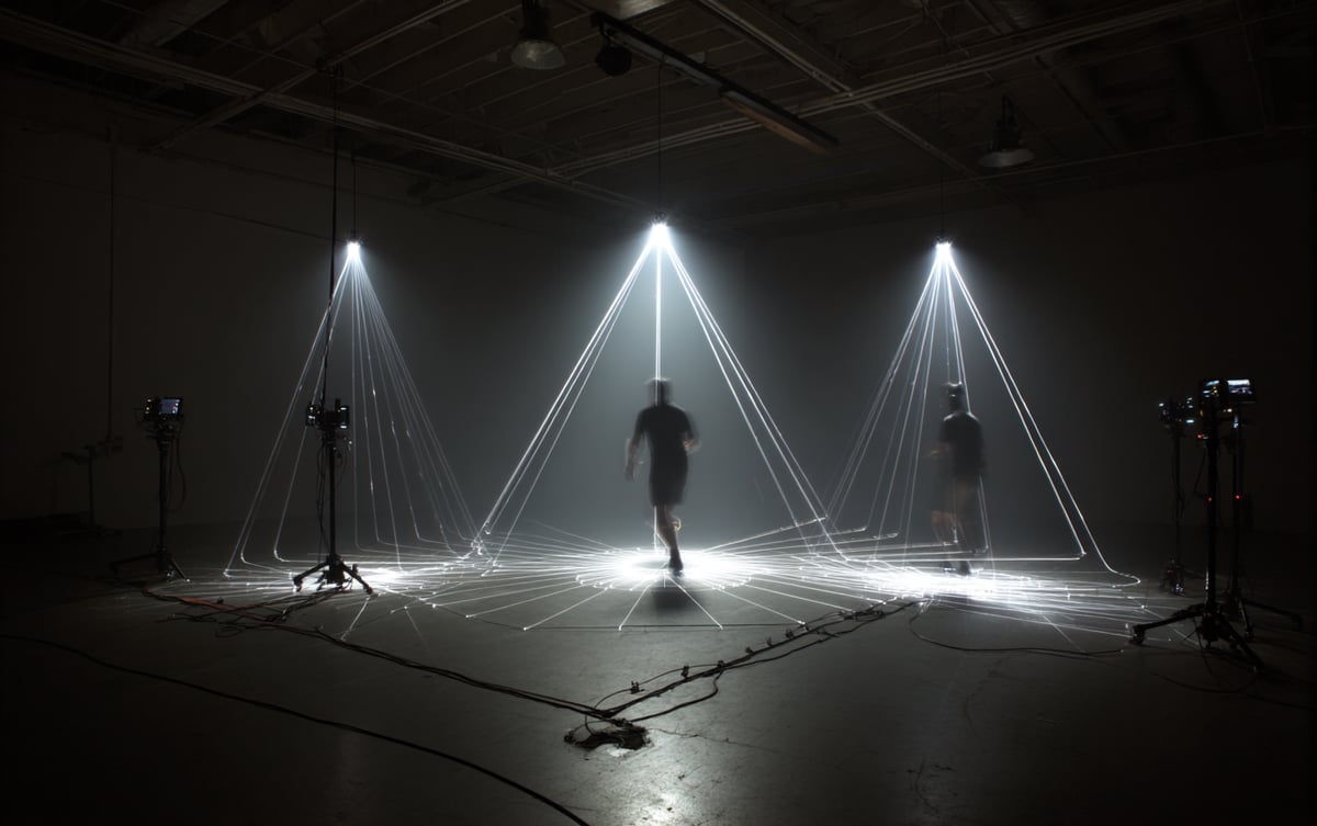 An illustrative capture volume showing human motion through a controlled space